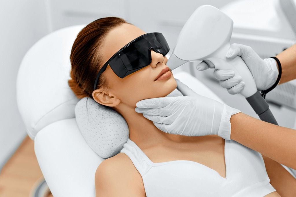 Woman getting laser hair removal to her upper lip